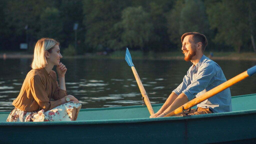 a man and woman in a boat